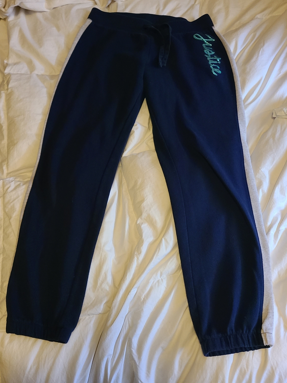 Justice Navy Joggers with Gray Side Stripes and Teal Logo